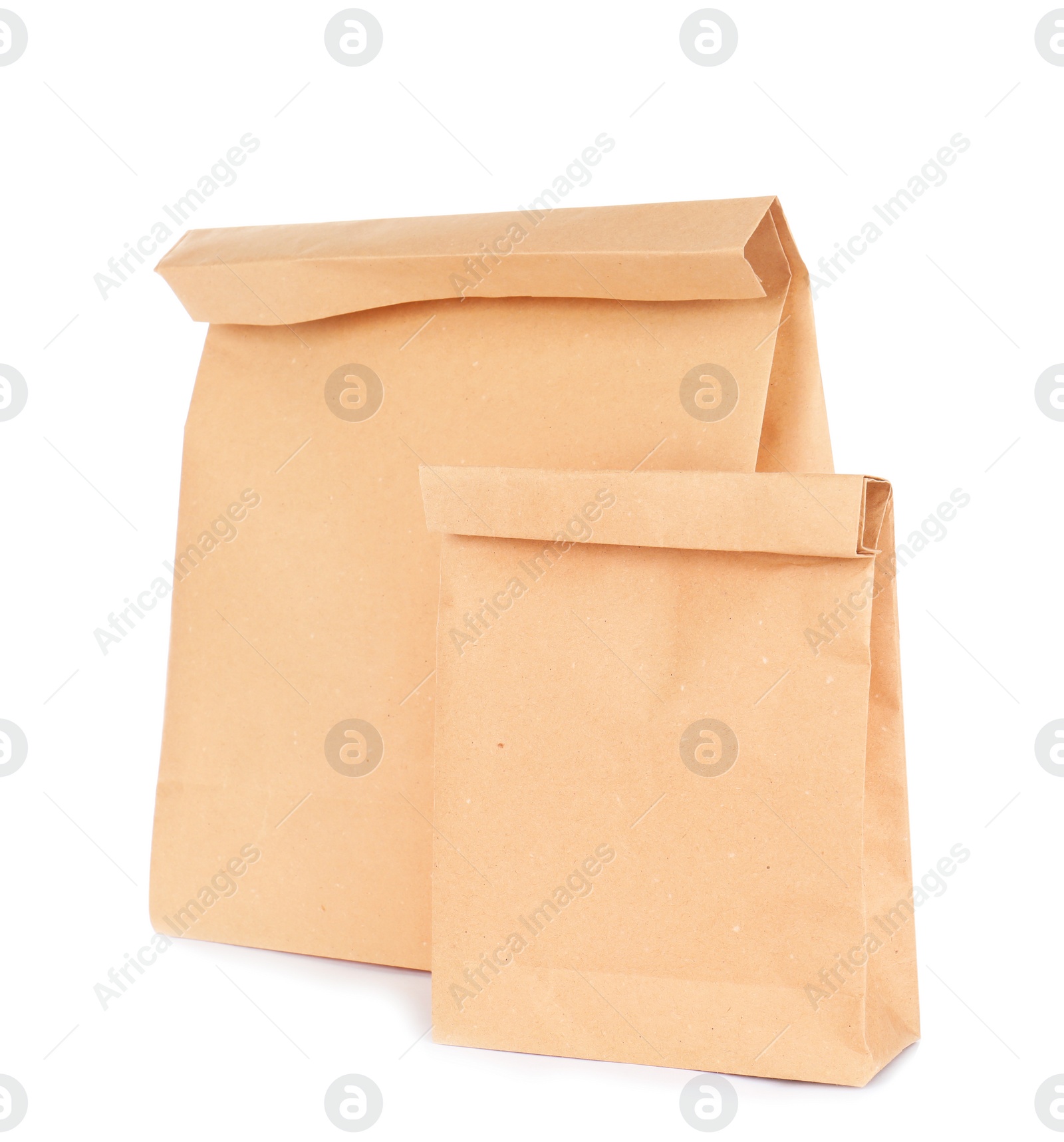 Photo of Paper bags isolated on white. Mockup for design