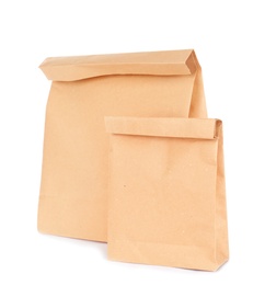 Photo of Paper bags isolated on white. Mockup for design