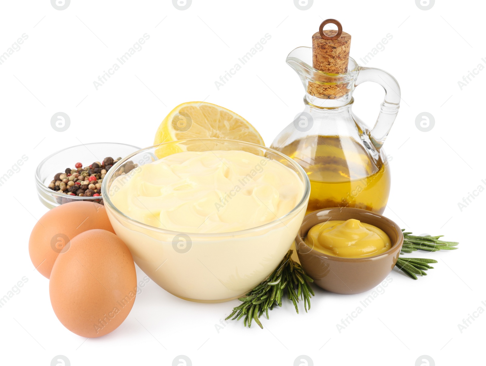 Photo of Delicious homemade mayonnaise, spices and ingredients on white background