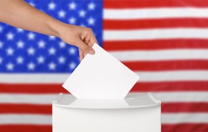 Election in USA. Man putting his vote into ballot box against national flag of United States, closeup. Banner design