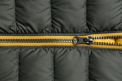 Photo of Jacket with zipper as background, top view