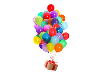 Many balloons tied to gift box on white background