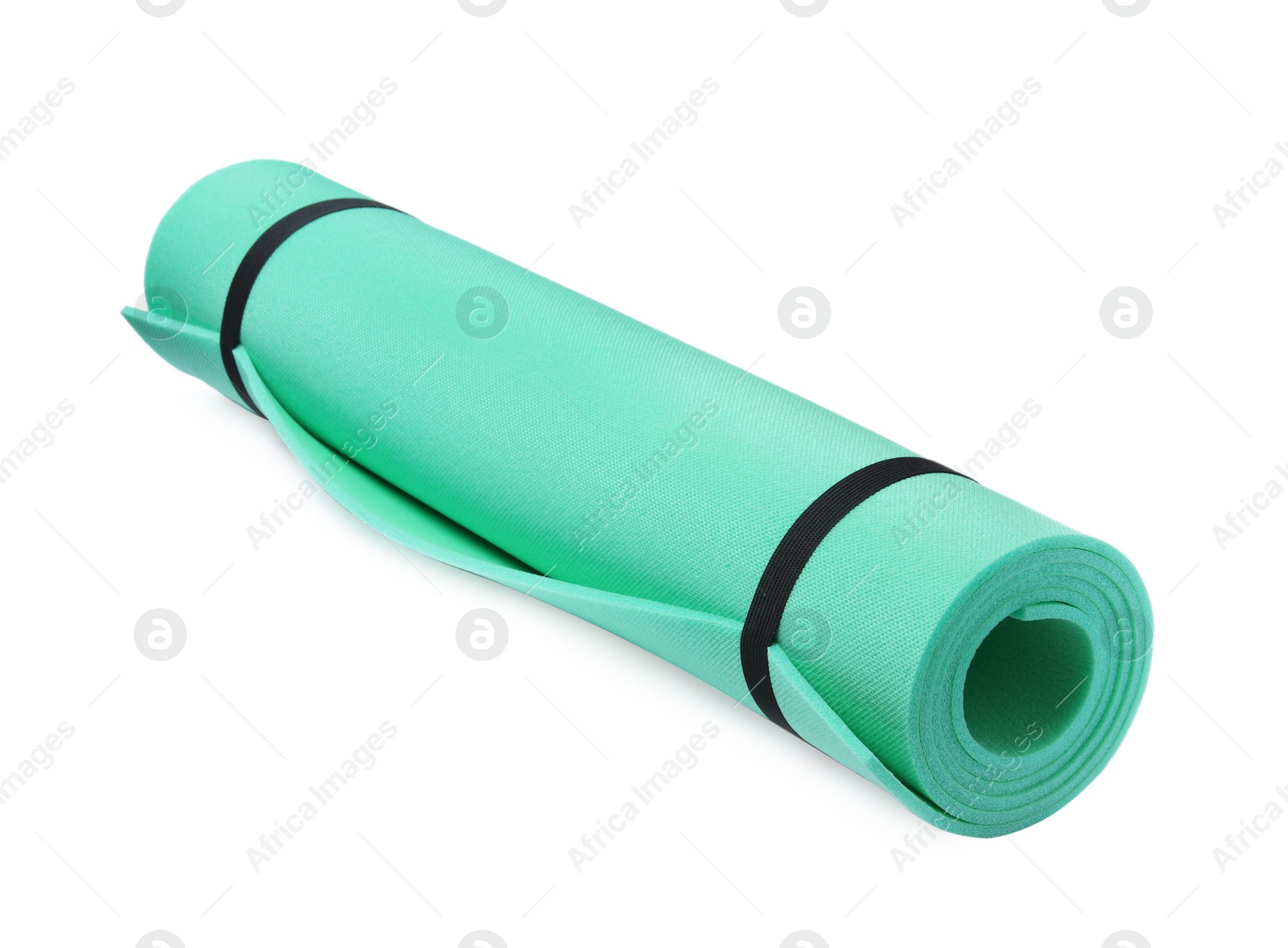 Photo of Rolled turquoise camping mat isolated on white