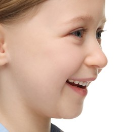 Photo of Portrait of cute little girl on white background, closeup