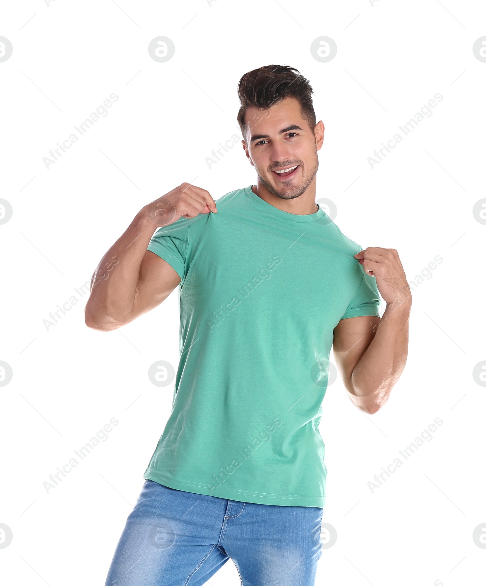 Photo of Young man in t-shirt on white background. Mockup for design