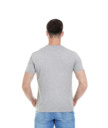 Photo of Young man in t-shirt on white background. Mockup for design