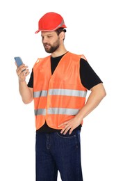 Man in reflective uniform with smartphone on white background