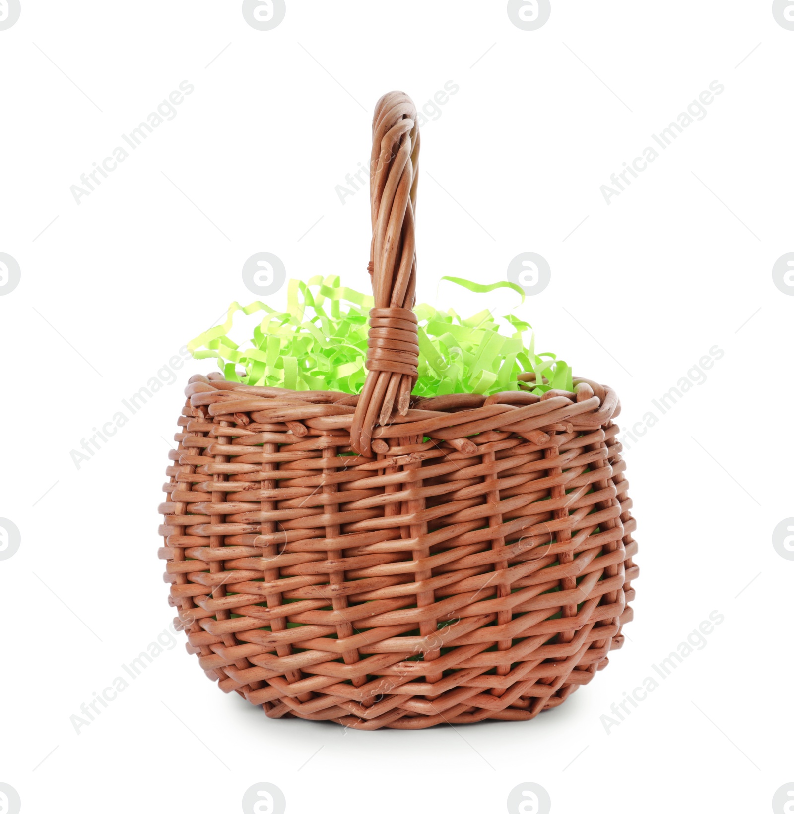 Photo of Easter wicker basket with decorated grass isolated on white