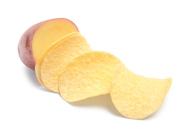 Raw potato and tasty chips on white background