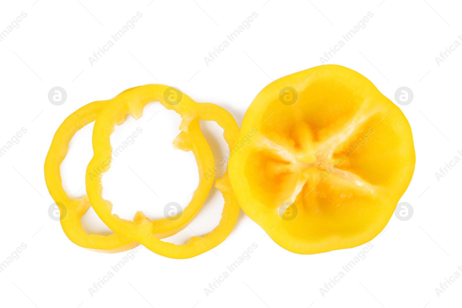 Photo of Cut yellow bell pepper isolated on white, top view