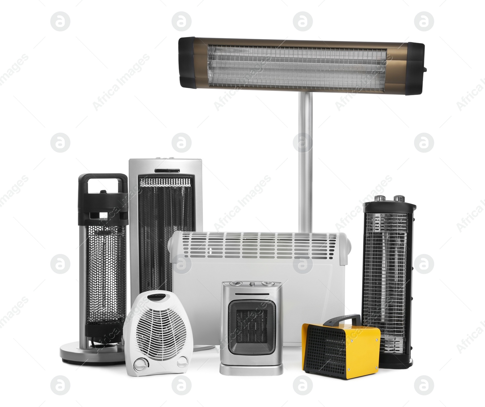 Photo of Many different electric heaters on white background