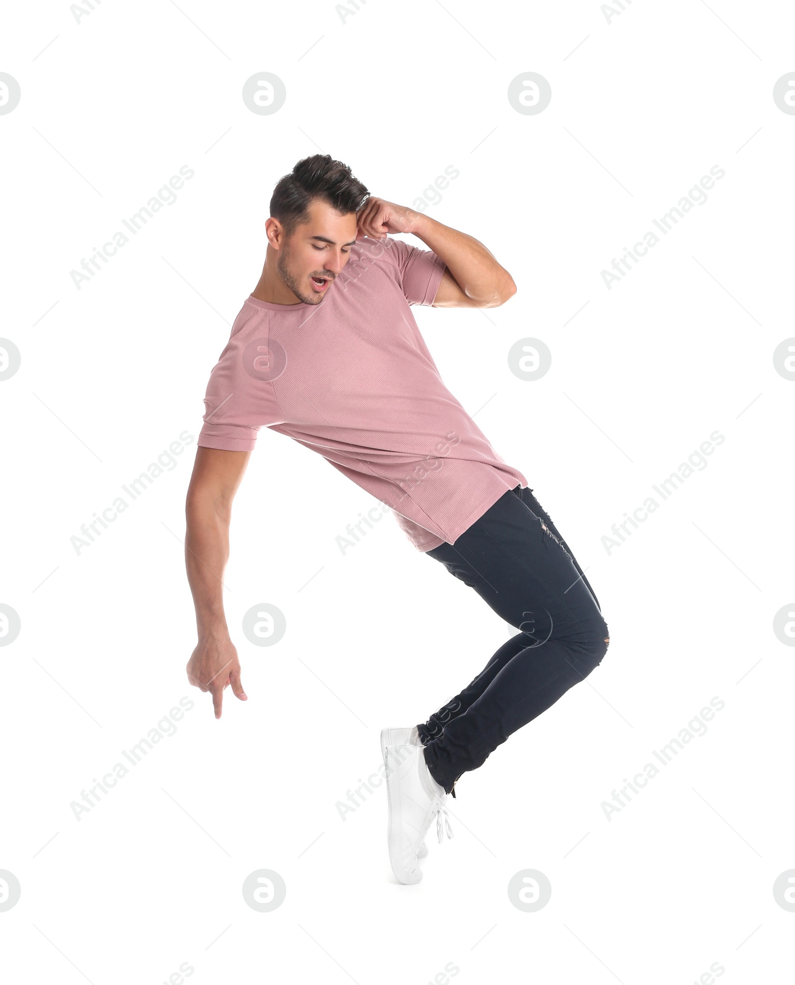 Photo of Young man in stylish jeans on white background