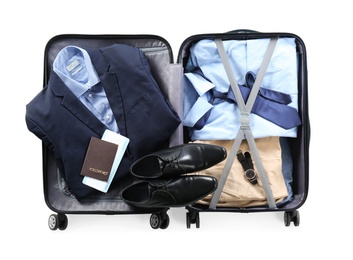 Packed suitcase with office wear and passport on white background, top view