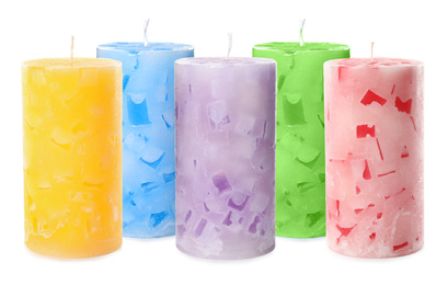 Image of Set of color wax candles on white background