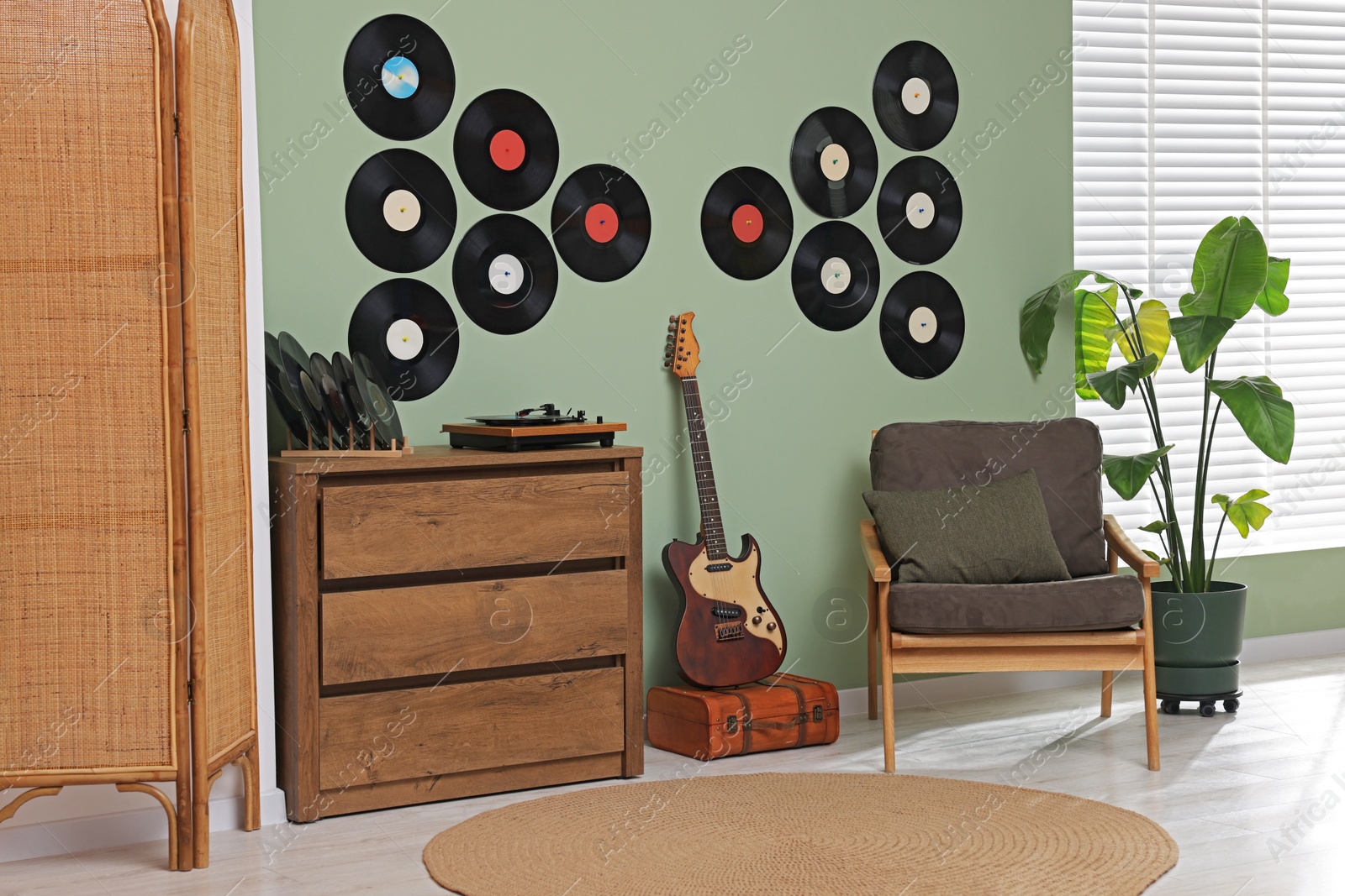 Photo of Living room interior decorated with vinyl records