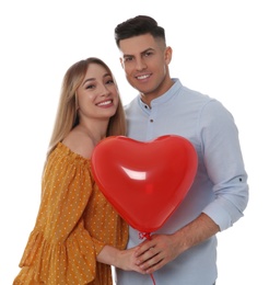 Photo of Lovely couple with heart shaped balloon on white background. Valentine's day celebration