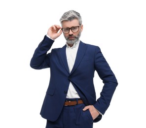 Mature businessman in stylish clothes posing on white background, low angle view