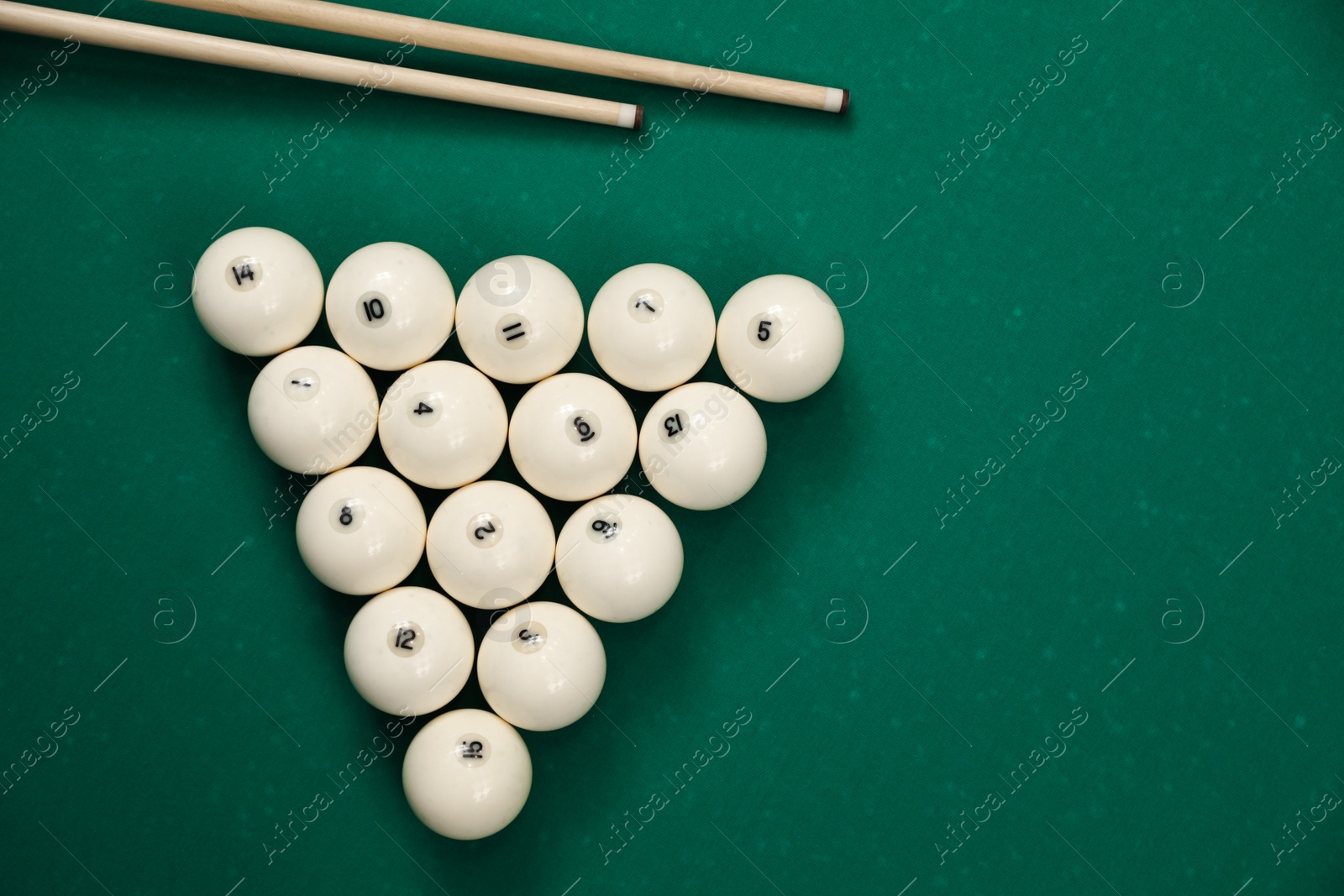 Photo of Flat lay composition with balls on billiard table. Space for text