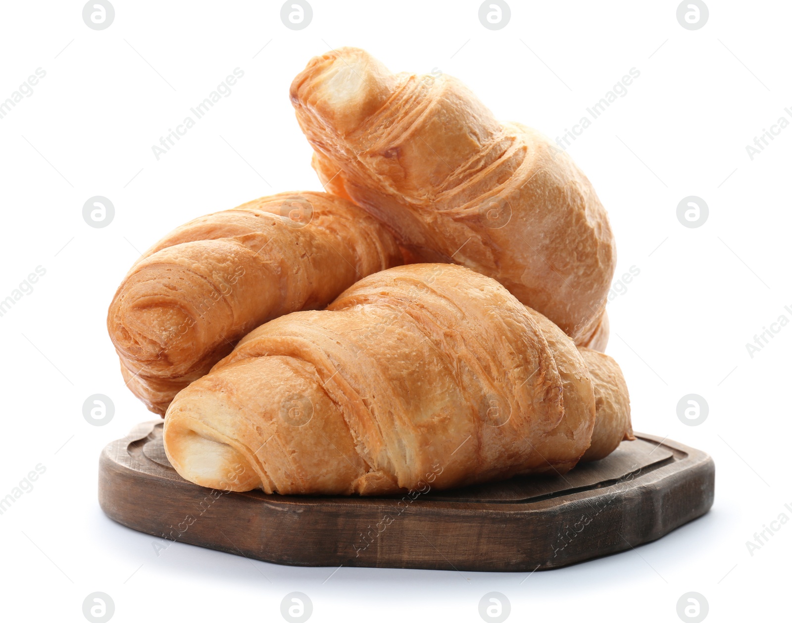 Photo of Wooden board with tasty croissants on white background