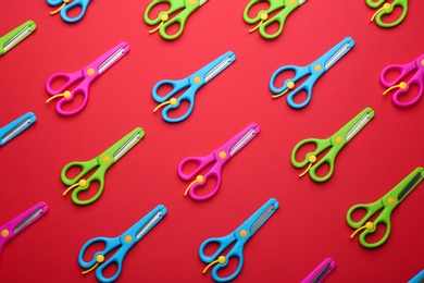 Set of scissors on color background, flat lay