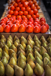 Tasty fresh fruits on counter at wholesale market