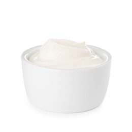 Photo of Bowl with sour cream on white background