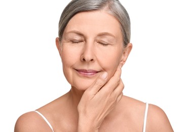 Photo of Portrait of senior woman with aging skin on white background. Rejuvenation treatment