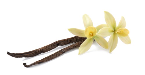 Photo of Aromatic vanilla sticks and beautiful flowers on white background
