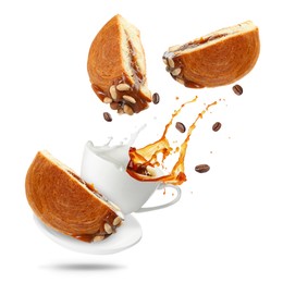 Image of Round croissants and coffee in air on white background