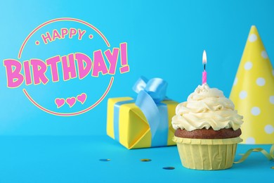 Image of Happy Birthday! Delicious cupcake with burning candle on light blue background 