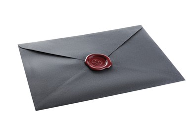 Photo of Black envelope with wax seal isolated on white