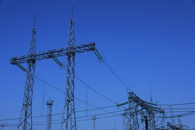 Photo of Modern electrical substation on sunny day, low angle view