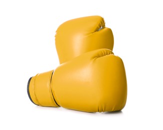 Pair of yellow boxing gloves isolated on white