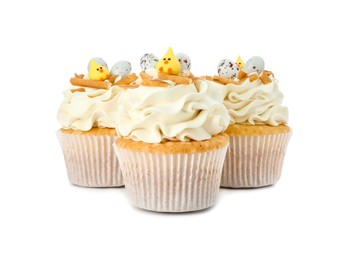 Photo of Tasty Easter cupcakes with vanilla cream isolated on white