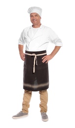 Photo of Mature male chef in apron on white background