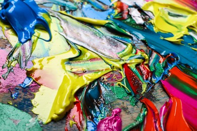Abstract colorful acrylic paint as background, closeup view