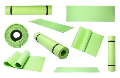 Image of Set with green camping mats on white background 