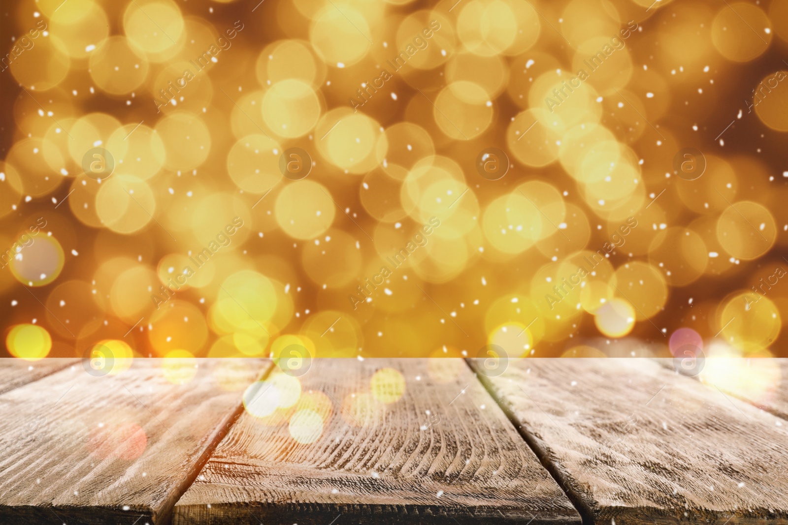 Image of Empty wooden surface and blurred Christmas lights on background, bokeh effect