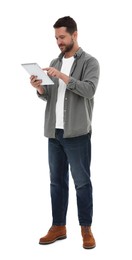 Photo of Handsome man using tablet on white background
