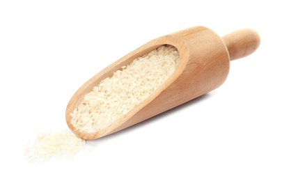 Photo of Scoop with uncooked rice on white background