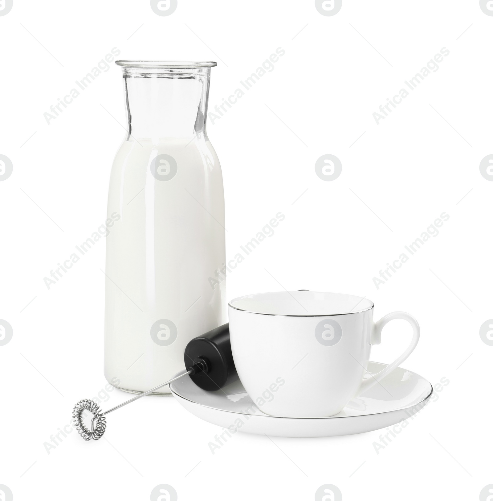 Photo of Milk frother wand, cup and glass carafe isolated on white