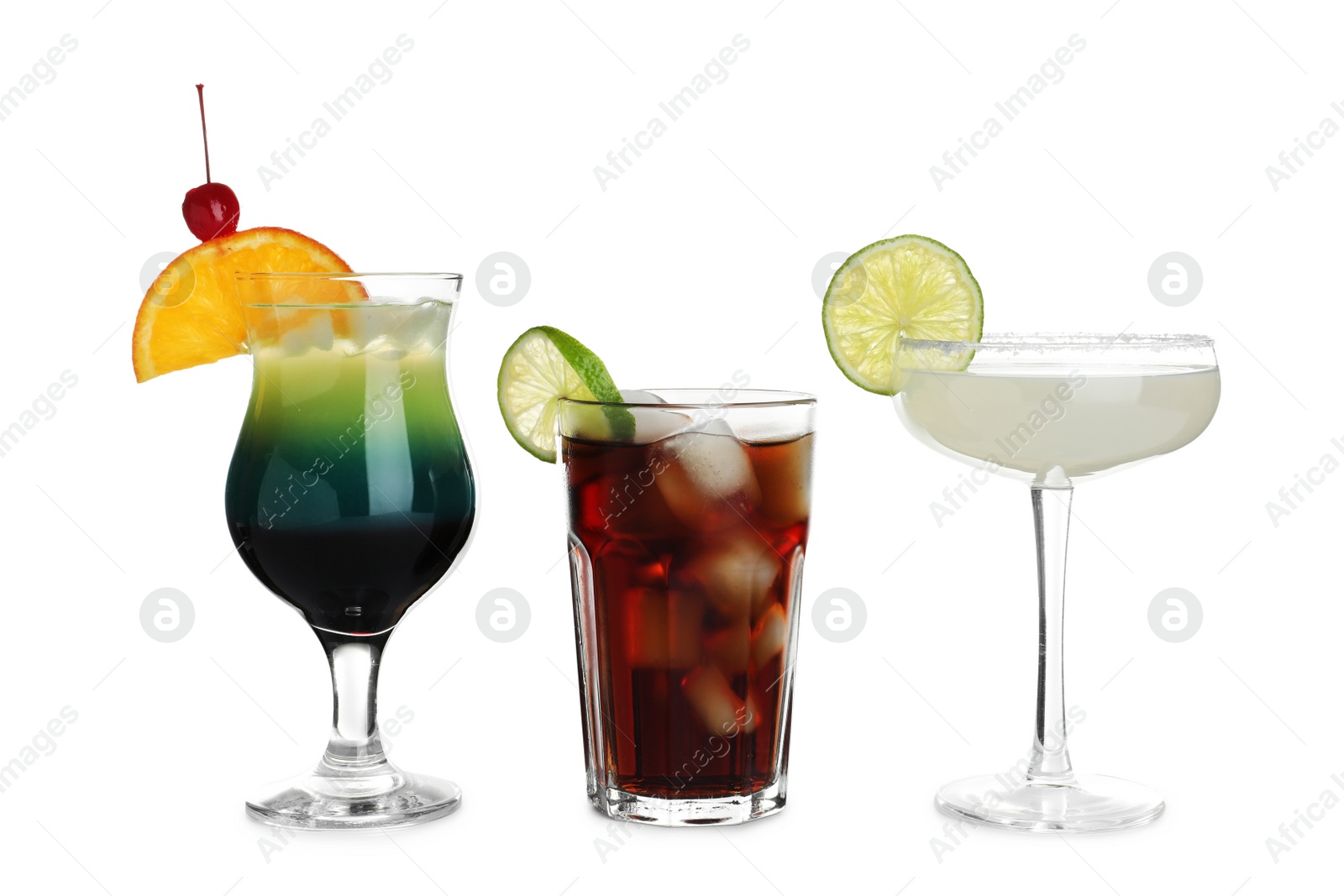 Photo of Glasses of traditional alcoholic cocktails on white background