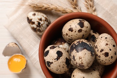 Photo of Fresh raw quail eggs on table, top view