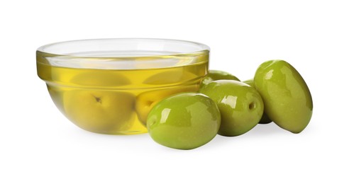 Photo of Cooking oil in glass bowl and olives on white background