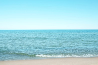 Beautiful view of sea shore and blue sky on sunny day