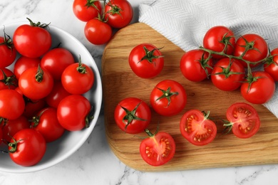 Flat lay composition with fresh cherry tomatoes on marble background