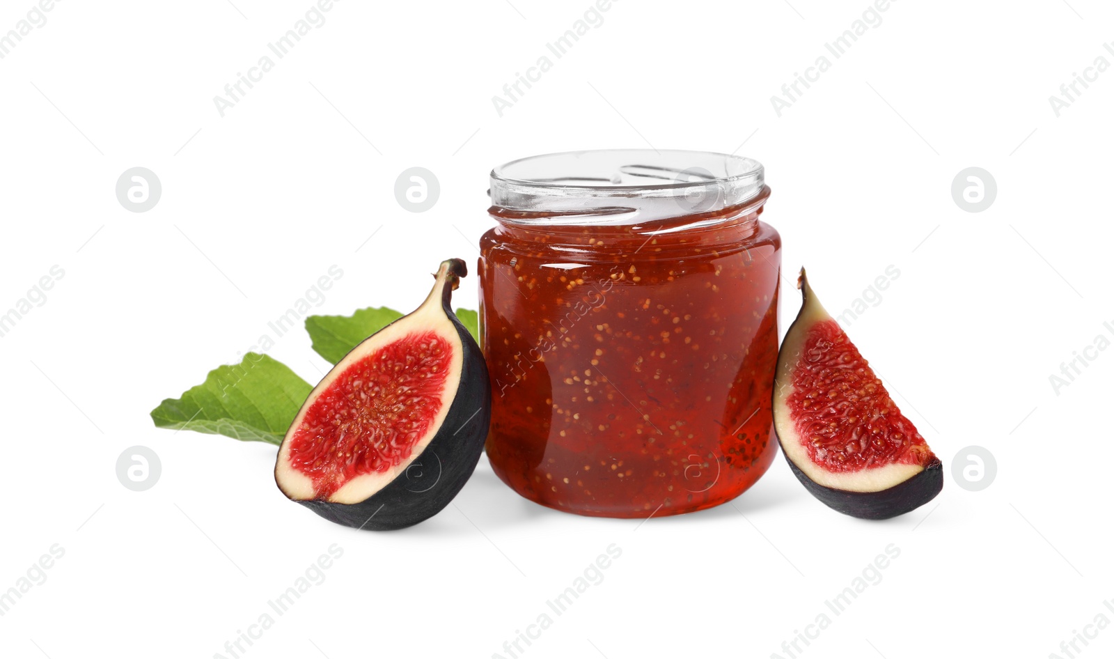 Photo of Glass jar with tasty sweet jam, green leaf and fresh figs isolated on white