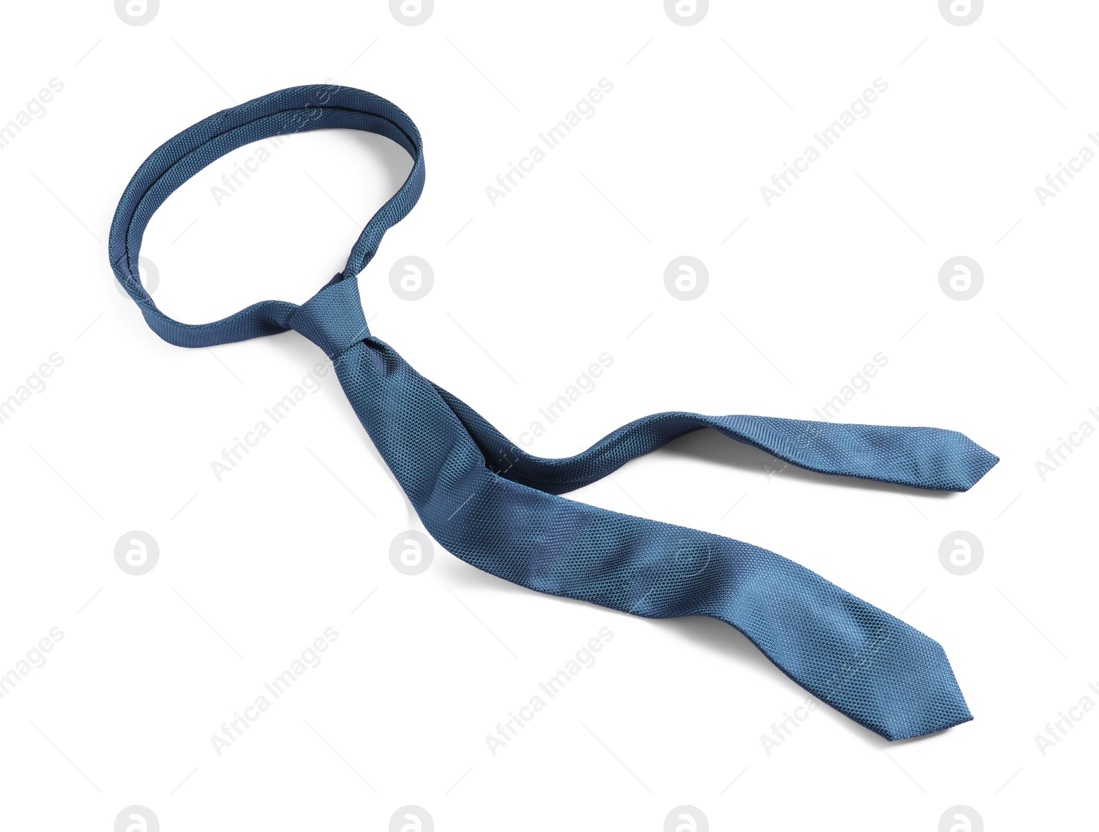 Photo of One blue necktie isolated on white, above view