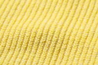 Texture of soft yellow fabric as background, closeup
