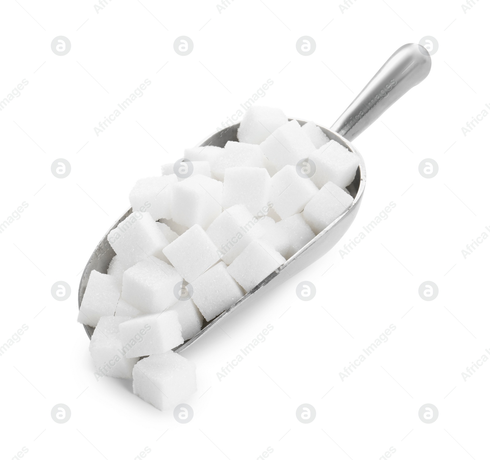 Photo of Sugar cubes in metal scoop isolated on white